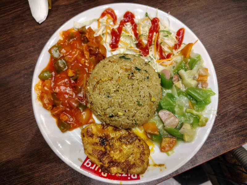Fried rice Chinese vegetable Sonali chicken fry coslo salad
